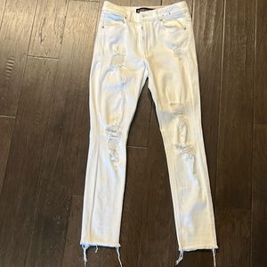Ripped white skinny jeans